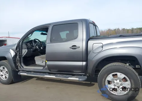 2014 Toyota Tacoma Base V6 z USA, uszkodzony, nr VIN 3TMLU4EN1EM162480